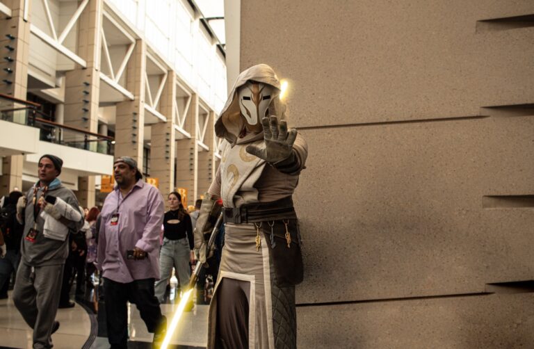 Live event coverage of cosplay, panels, and crowd action at C2E2 — fast-paced shooting in mixed natural and artificial light.